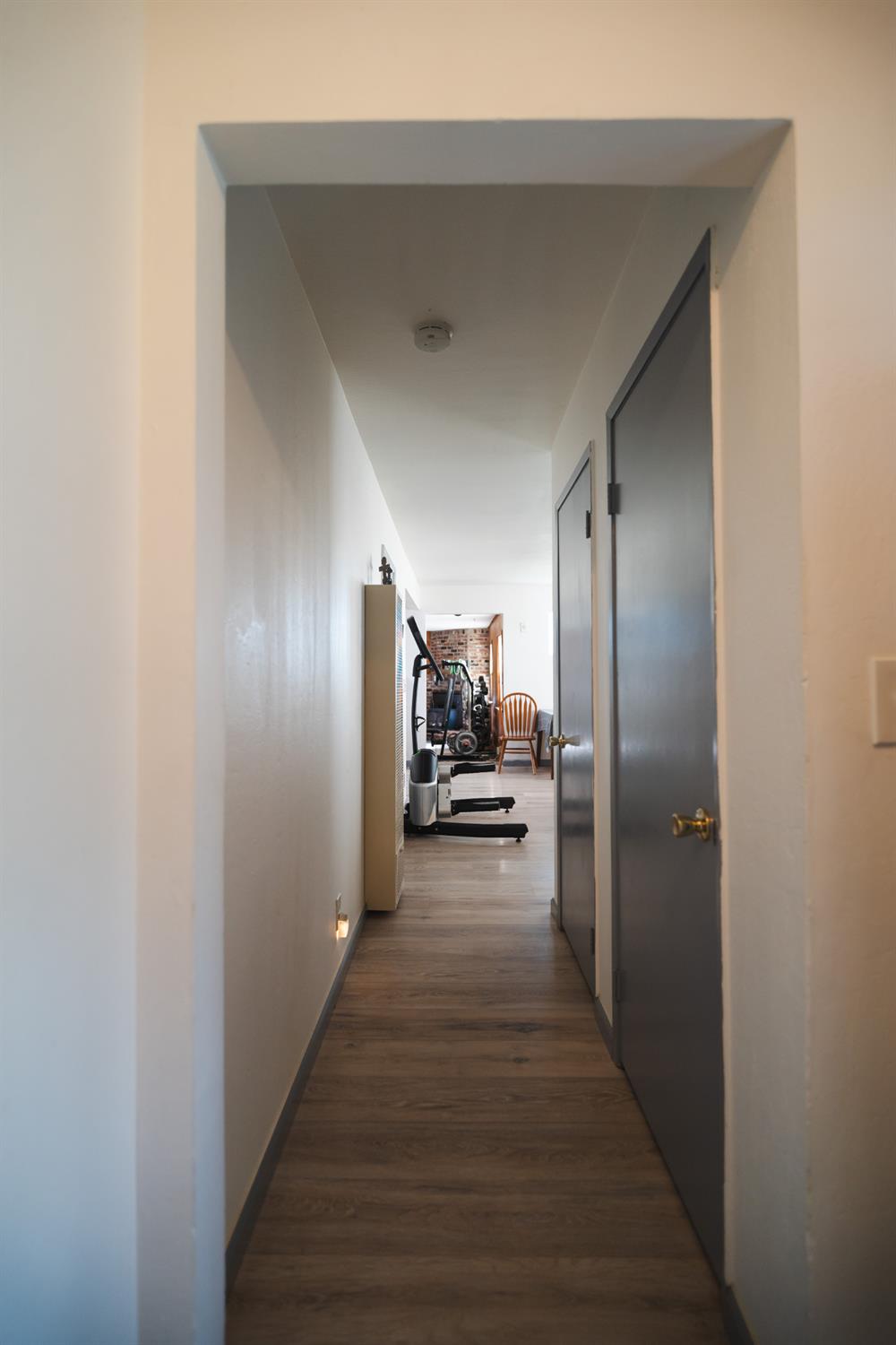 4551 Wheatland Road Wheatland, CA 95692 - Photo 6 of 50 a view of a hallway view with wooden floor