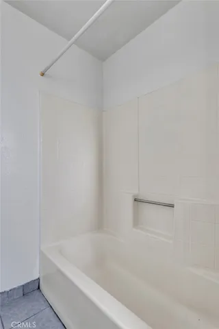 a view of a room that has a window in it