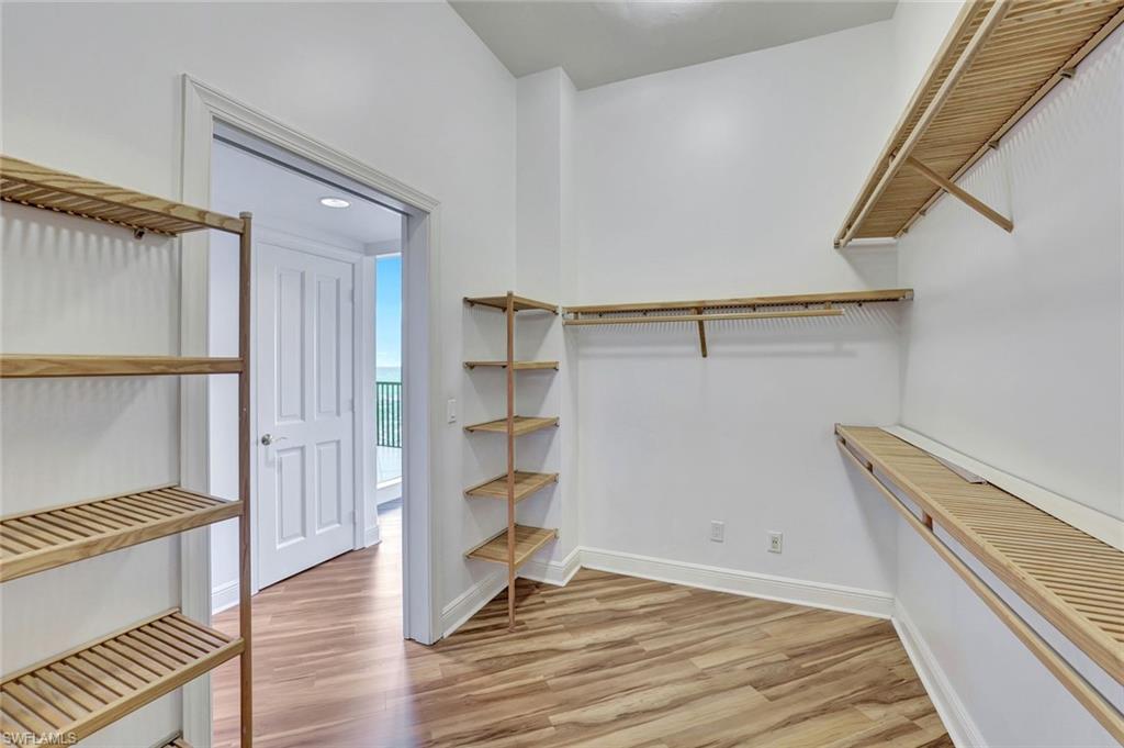 1060 Borghese Lane, Unit 2001 Naples, FL 34114 - Photo 14 of 35 Spacious closet with light wood-type flooring