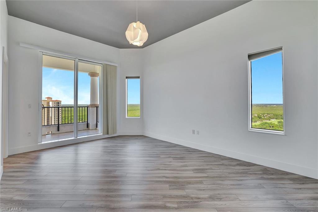 1060 Borghese Lane, Unit 2001 Naples, FL 34114 - Photo 20 of 35 Spare room featuring light wood finished floors