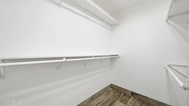 a bathroom with a shower and a toilet