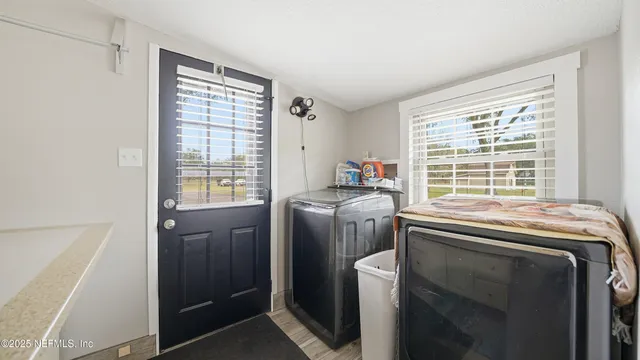 a swimming pool with outdoor seating and yard