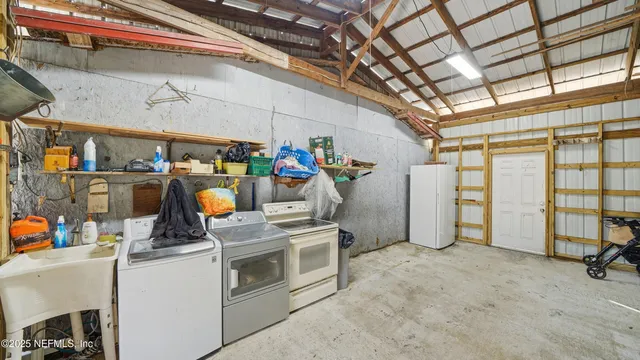 a swimming pool with trees in front of it