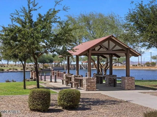a view of a chairs and table in the patio