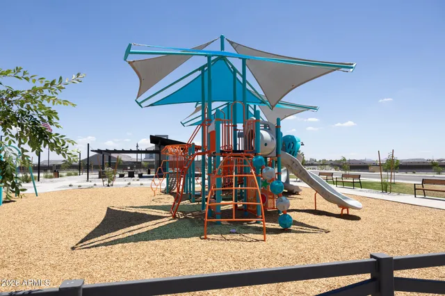 swimming pool with table and chairs