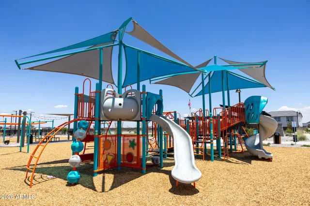a view of a slide with sitting area