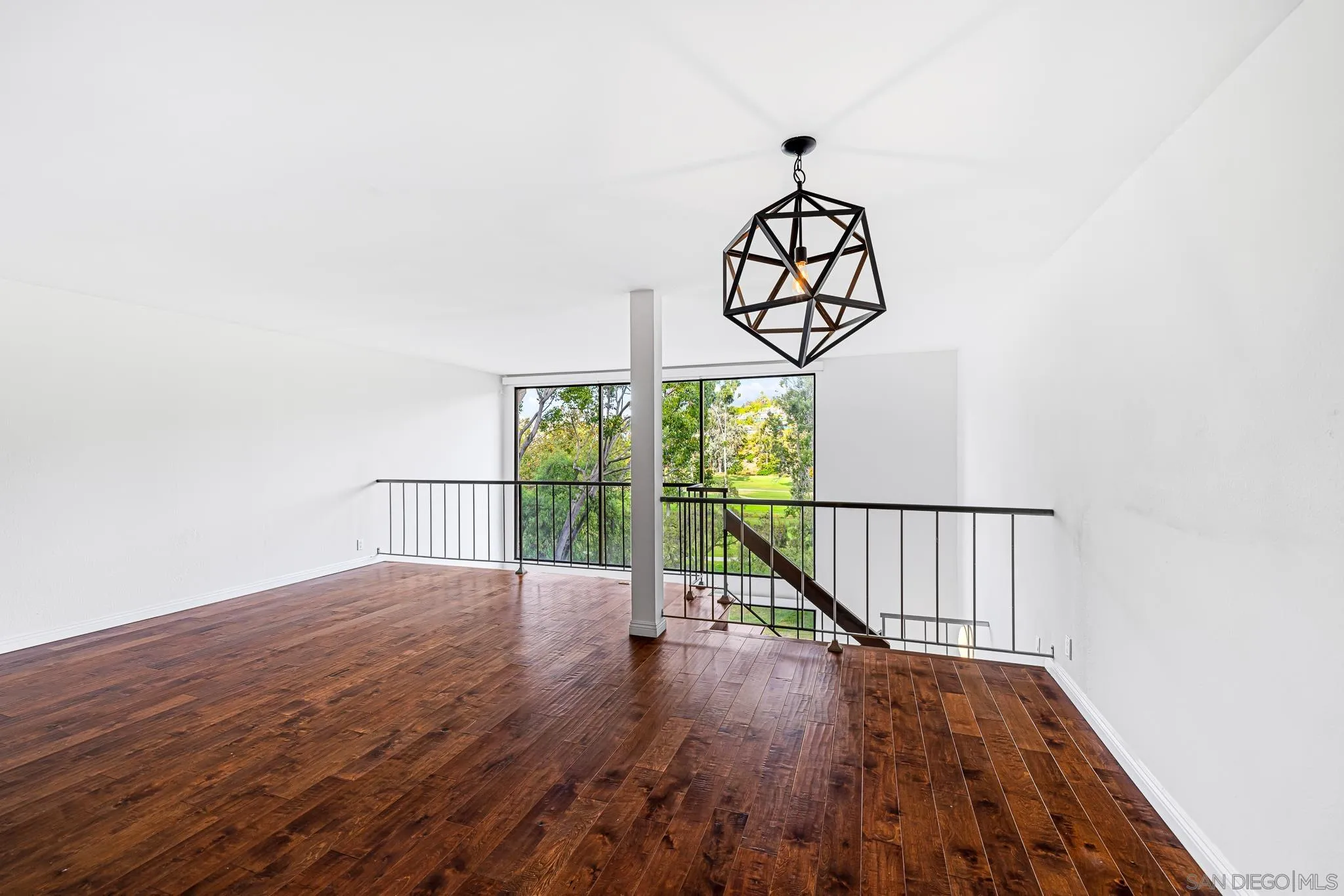 2564 Navarra Drive, Unit 108 Carlsbad, CA 92009 - Photo 4 of 23 a view of entryway with wooden floor