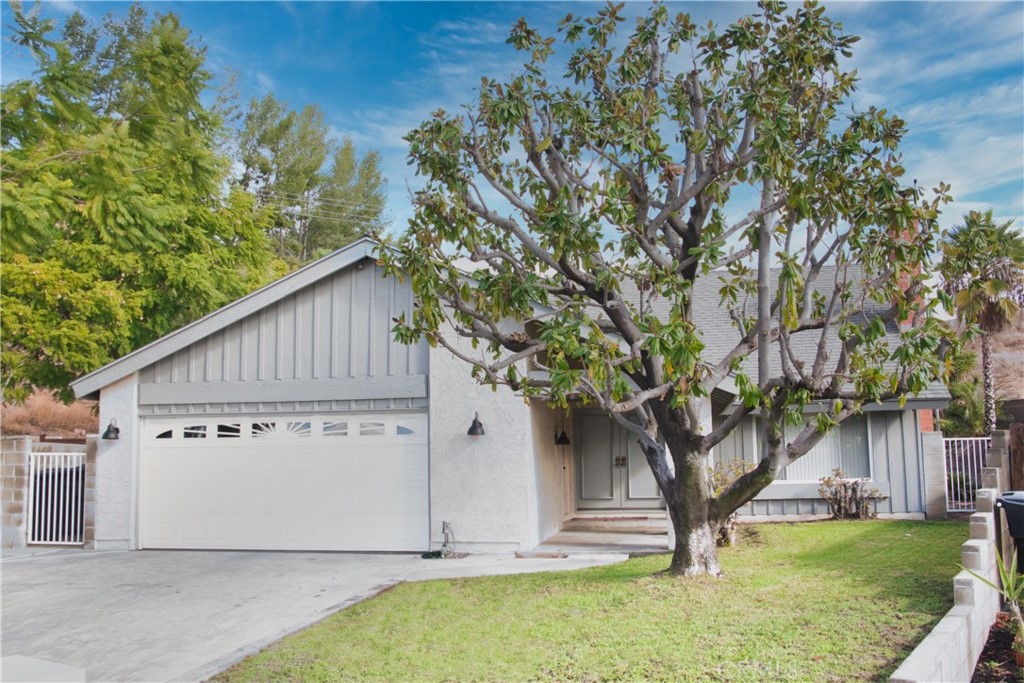 899 Mango Street Brea, CA 92821 - Photo 1 of 1 a view of a house with a yard