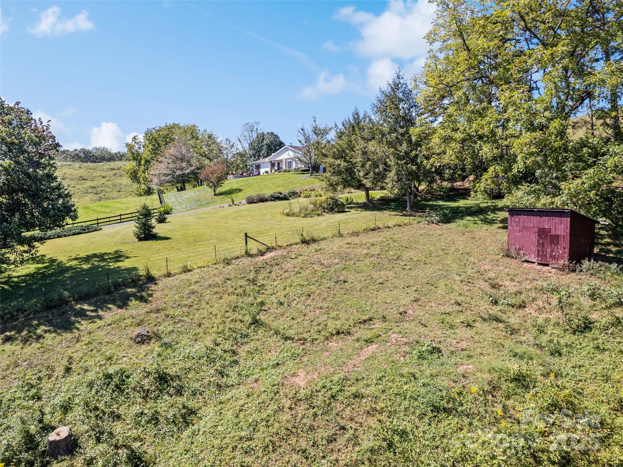 3735 Iron Duff Road Waynesville, NC 28785 - Photo 11 of 48 a view of a yard with trees