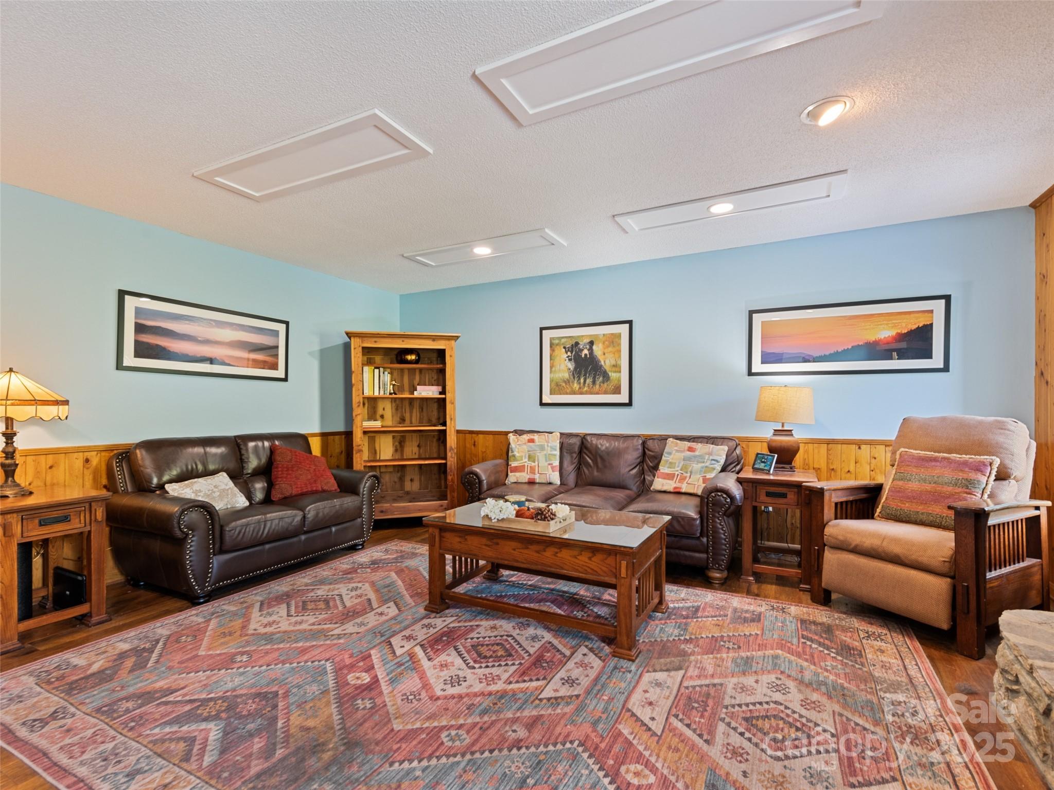 3735 Iron Duff Road Waynesville, NC 28785 - Photo 13 of 48 a living room with furniture and a couch