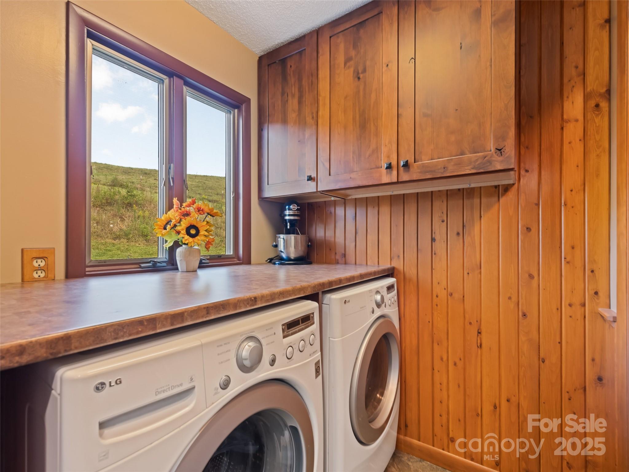 3735 Iron Duff Road Waynesville, NC 28785 - Photo 23 of 48 a utility room with dryer and washer