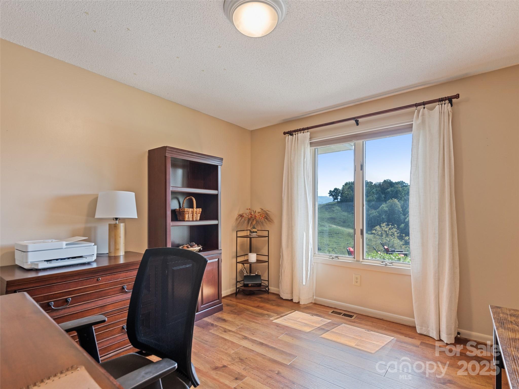 3735 Iron Duff Road Waynesville, NC 28785 - Photo 28 of 48 a workspace with furniture and window