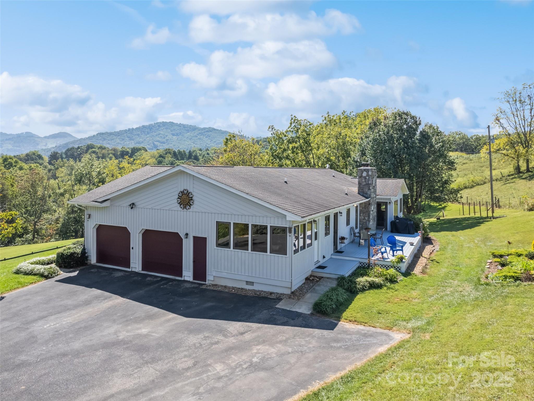 3735 Iron Duff Road Waynesville, NC 28785 - Photo 4 of 48 a view of a house with a yard