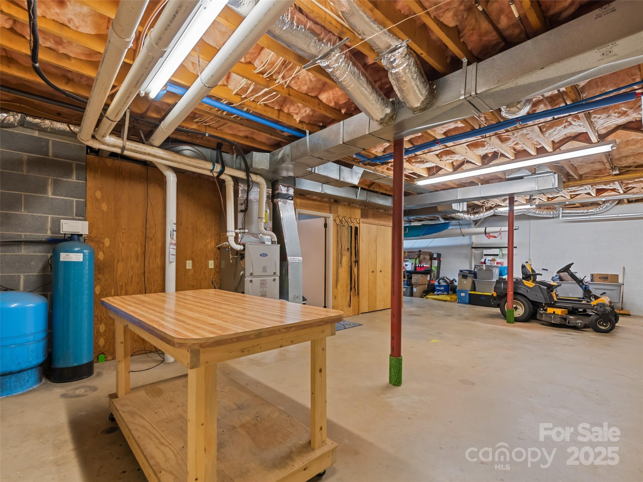 3735 Iron Duff Road Waynesville, NC 28785 - Photo 45 of 48 a view of a room with gym equipment