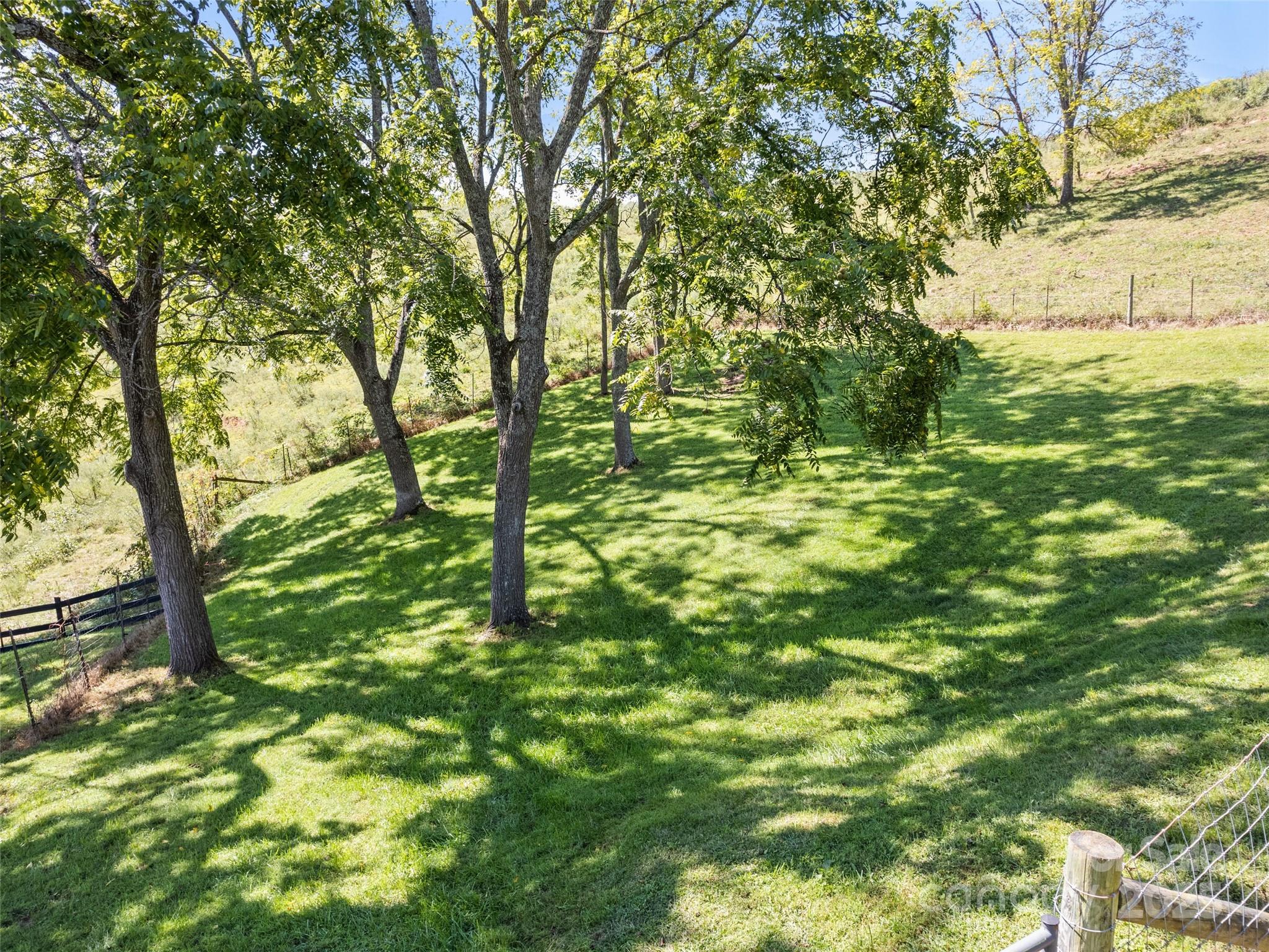 3735 Iron Duff Road Waynesville, NC 28785 - Photo 9 of 48 a view of outdoor space with deck and yard