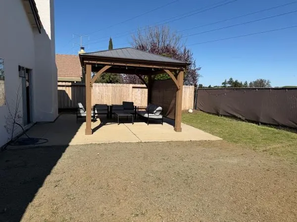 a front view of a house with yard