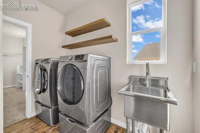 a utility room with dryer and washer