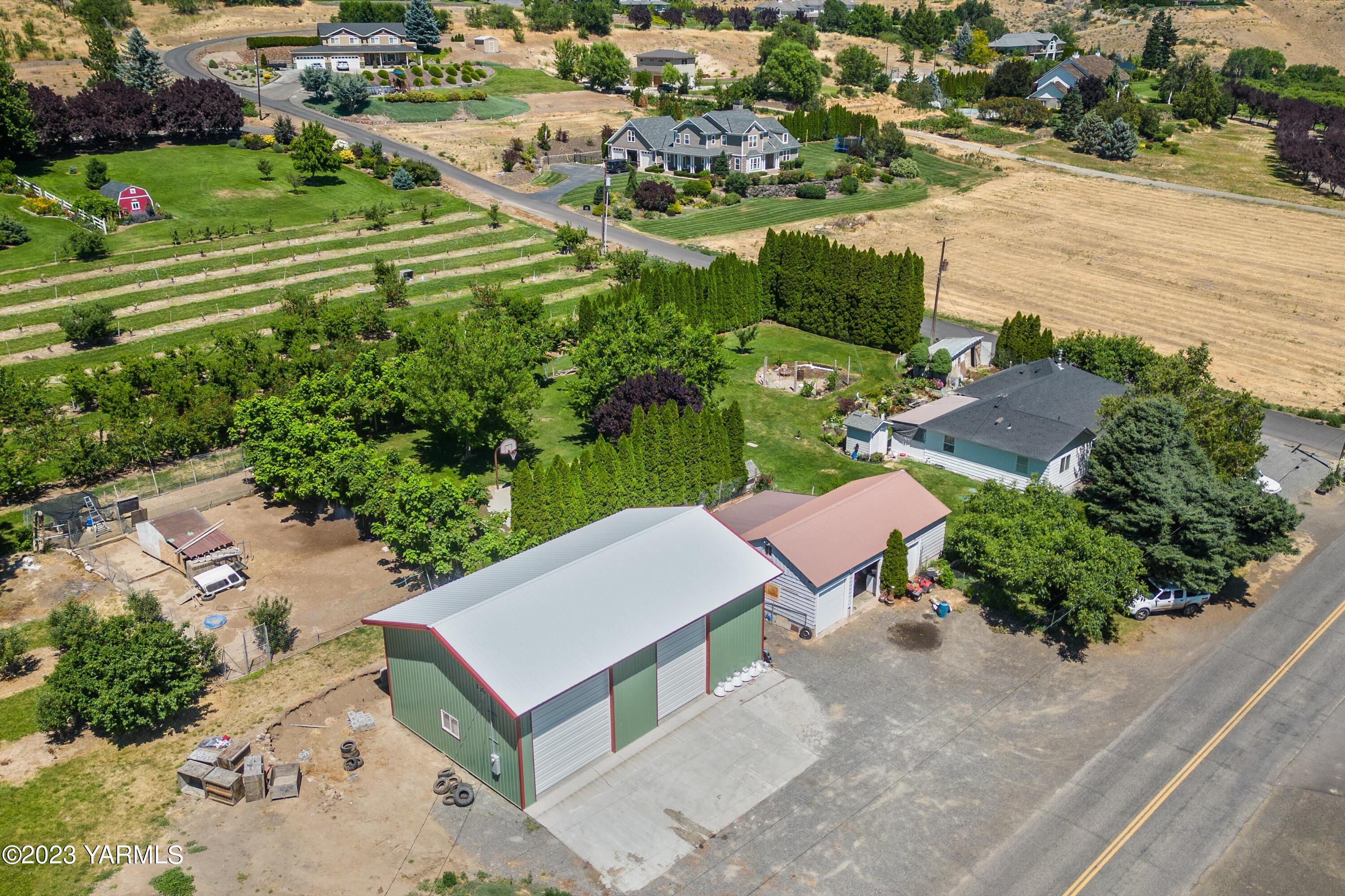 14901 Summitview Ext Road Yakima, WA 98908 - Photo 19 of 24 an aerial view of a house with a yard and lake view