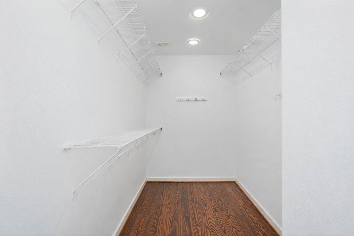 906 Andrews Street Houston, TX 77019 - Photo 16 of 23 a view of small space with racks on the wall