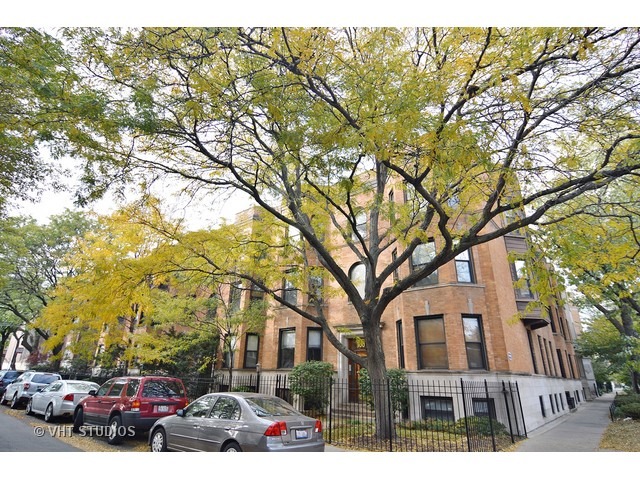front view of a house with a trees