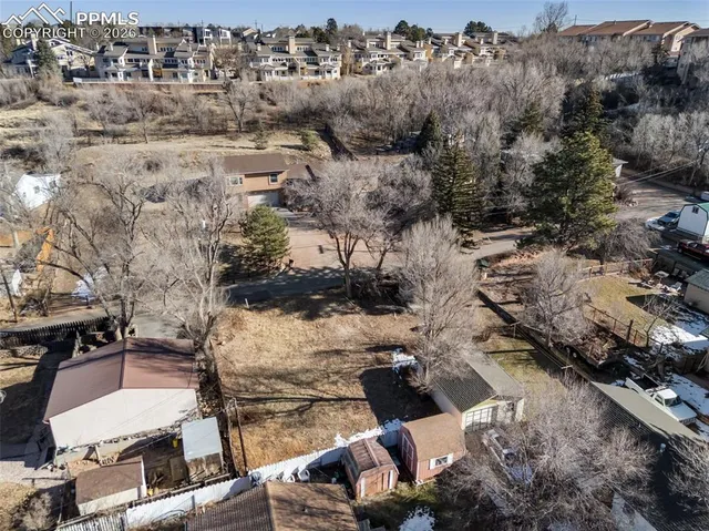 an aerial view of residential house with outdoor space