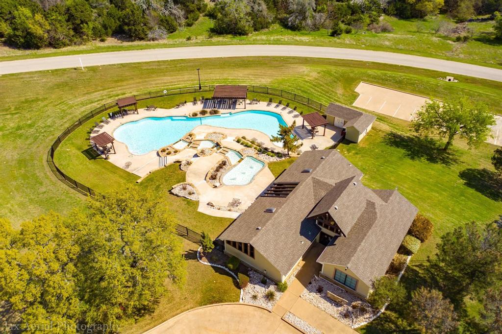 39160 Rock Ridge Drive Whitney, TX 76692 - Photo 17 of 27 a view of a swimming pool with an ocean view