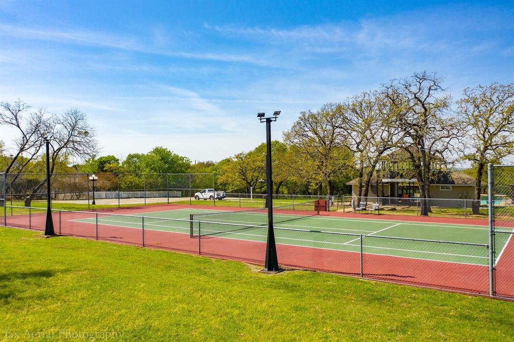 39160 Rock Ridge Drive Whitney, TX 76692 - Photo 18 of 27 a view of an outdoor space and tennis court