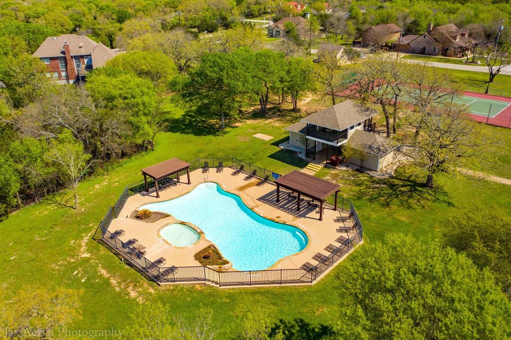 39160 Rock Ridge Drive Whitney, TX 76692 - Photo 19 of 27 an aerial view of a house with a swimming pool yard and outdoor seating