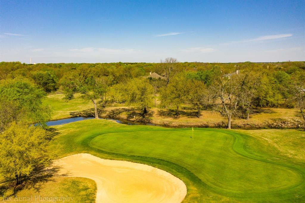 39160 Rock Ridge Drive Whitney, TX 76692 - Photo 23 of 27 a view of a swimming pool with an outdoor space and seating area