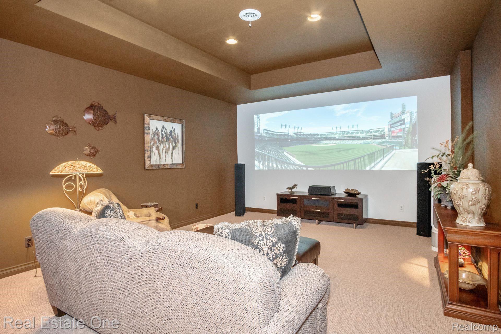 9091 Northpointe Ridge Brighton, MI 48114 - Photo 41 of 56 No longer have to leave your home to go to the movies in this theater.