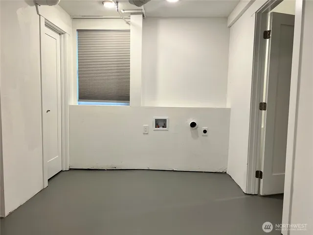 a view of a hallway with closet