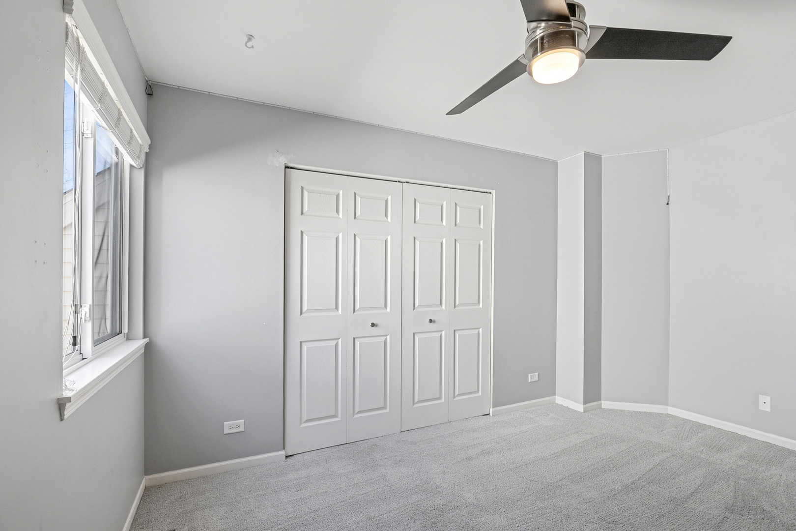 25904 Brooks Farm Road Round Lake, IL 60073 - Photo 13 of 20 an empty room with windows and fan