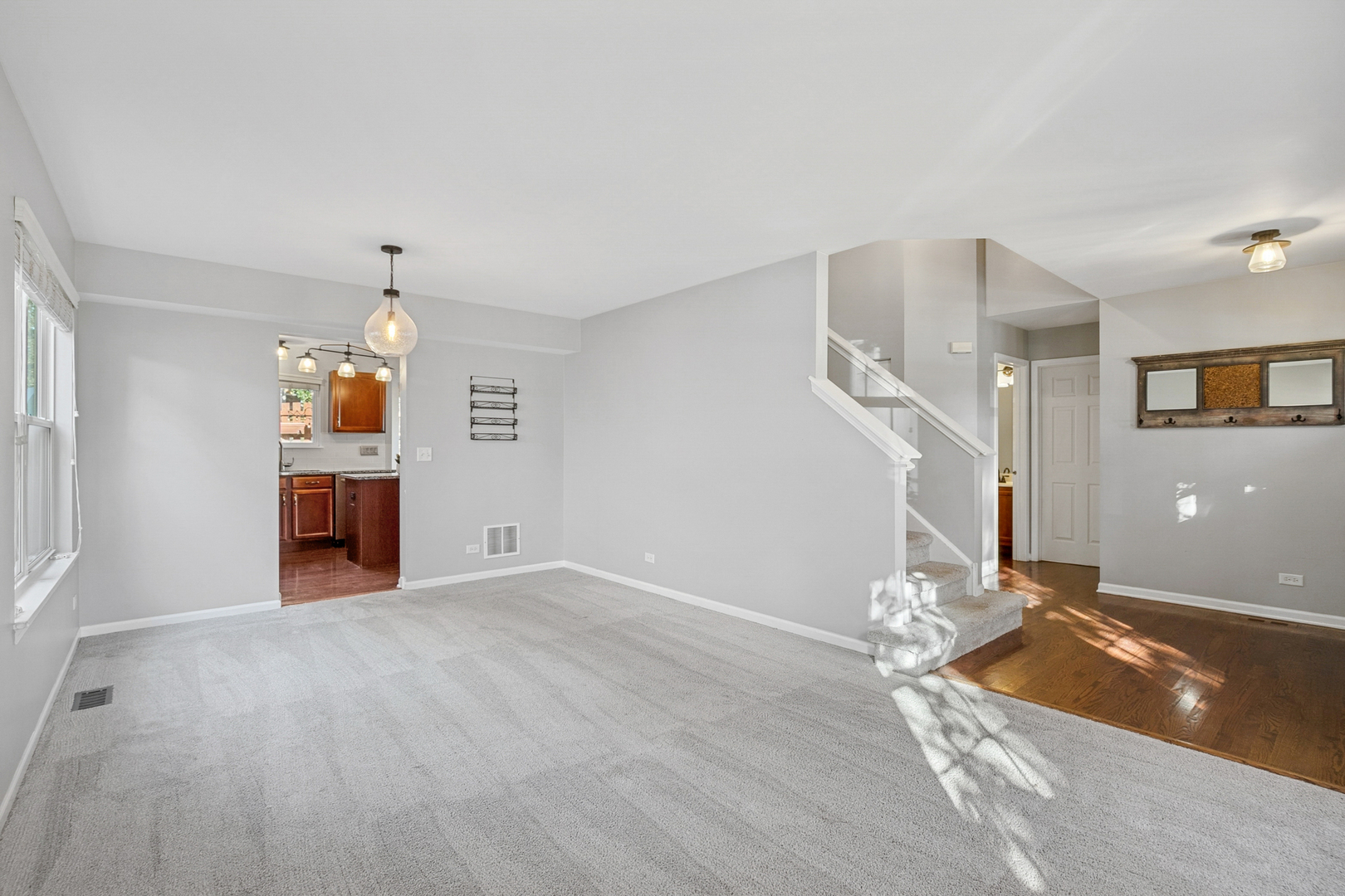 25904 Brooks Farm Road Round Lake, IL 60073 - Photo 3 of 20 a view of a livingroom with furniture and an empty room