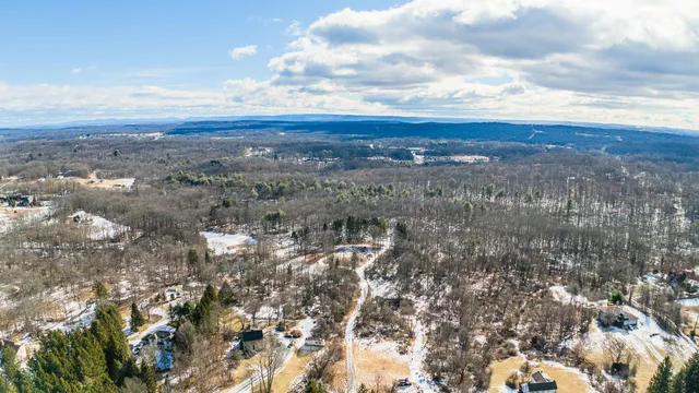a view of a wooden floor in a room