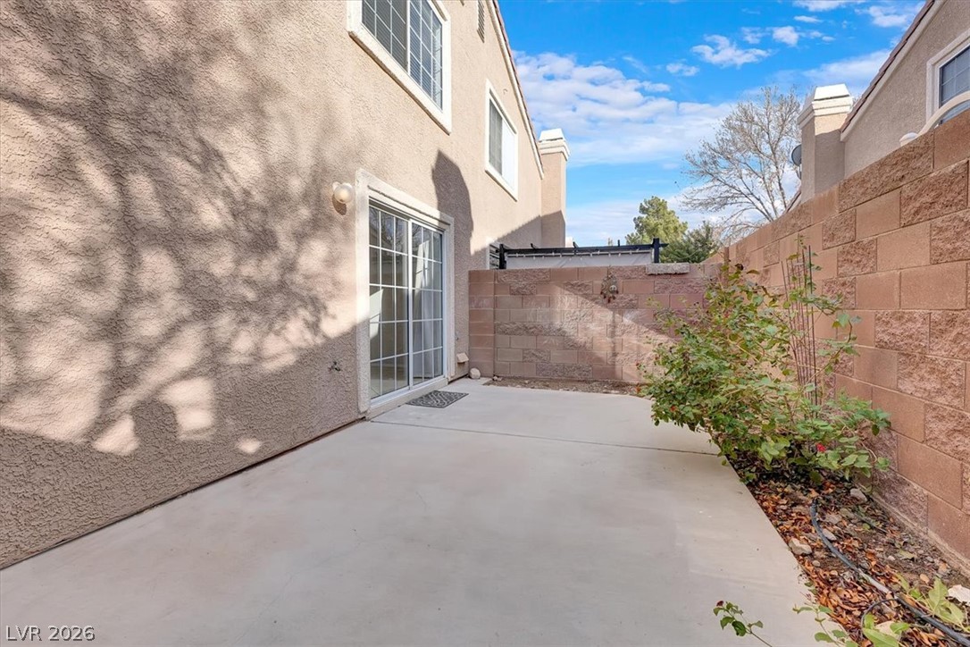 10148 Tree Bark Street Las Vegas, NV 89183 - Photo 30 of 37 A private, sun-drenched patio space awaits for serene outdoor moments.