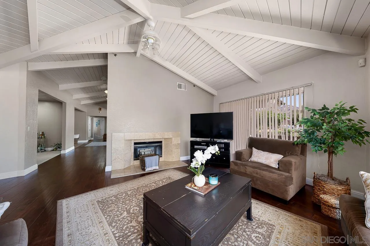 719 Singing Trails Drive El Cajon, CA 92019 - Photo 17 of 73 a living room with furniture and a flat screen tv