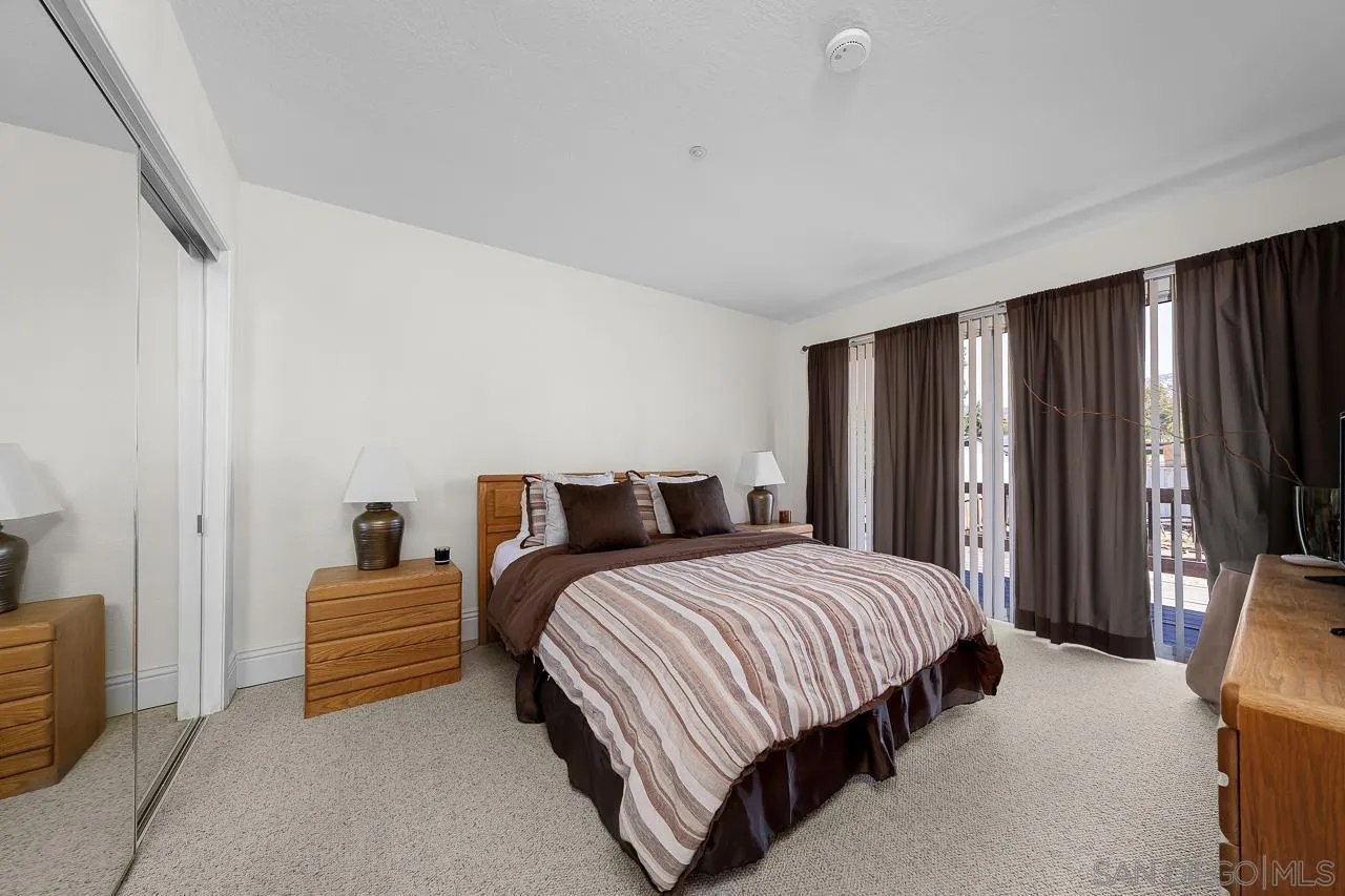 719 Singing Trails Drive El Cajon, CA 92019 - Photo 28 of 73 a bedroom with a bed and a couch