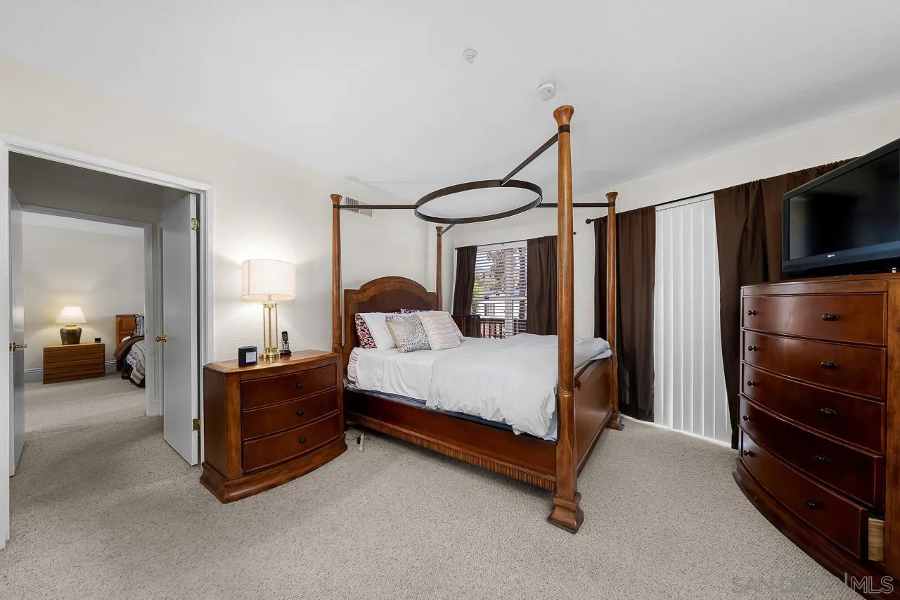 719 Singing Trails Drive El Cajon, CA 92019 - Photo 31 of 73 a bedroom with a bed and walk in closet