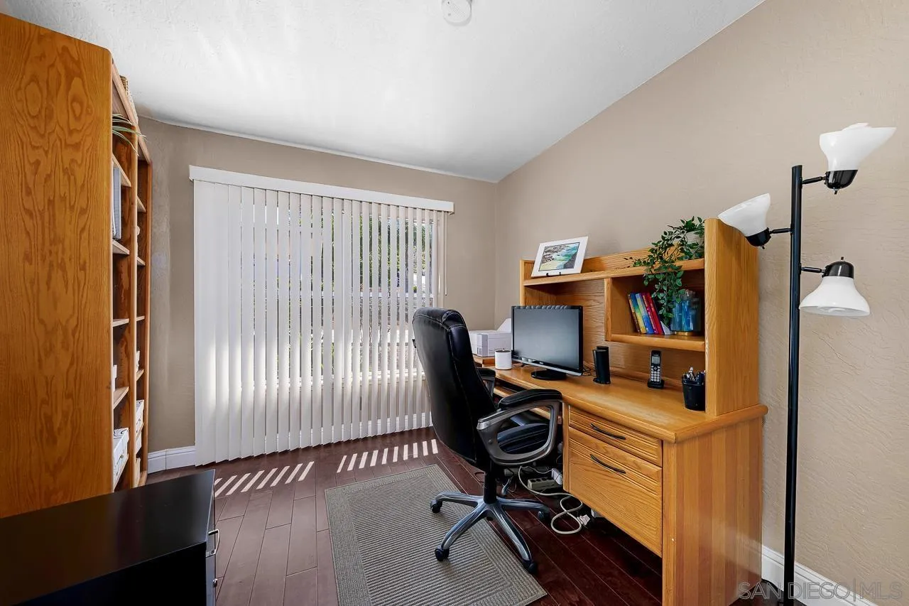 719 Singing Trails Drive El Cajon, CA 92019 - Photo 38 of 73 a view of a workspace with furniture and a window