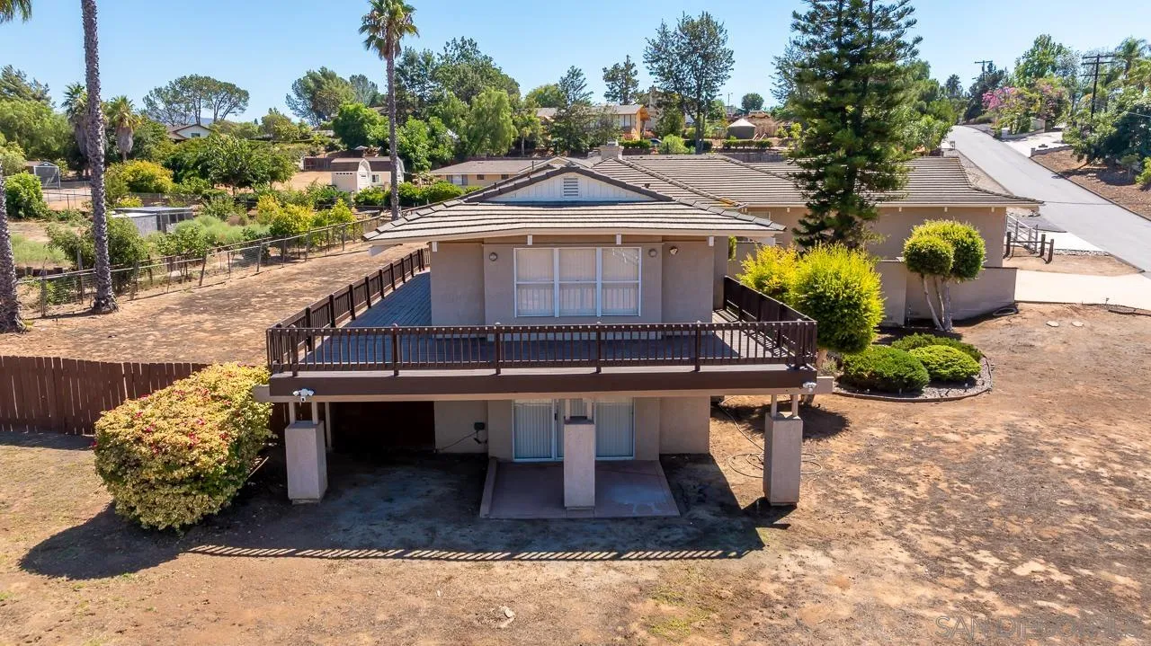 719 Singing Trails Drive El Cajon, CA 92019 - Photo 49 of 73 a swimming pool with outdoor seating and trees
