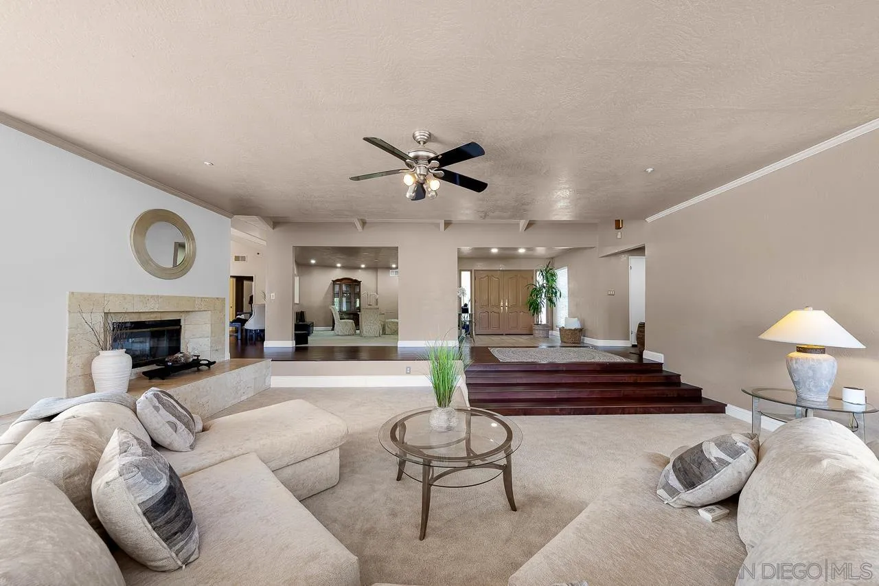 719 Singing Trails Drive El Cajon, CA 92019 - Photo 5 of 73 a living room with furniture and a fireplace