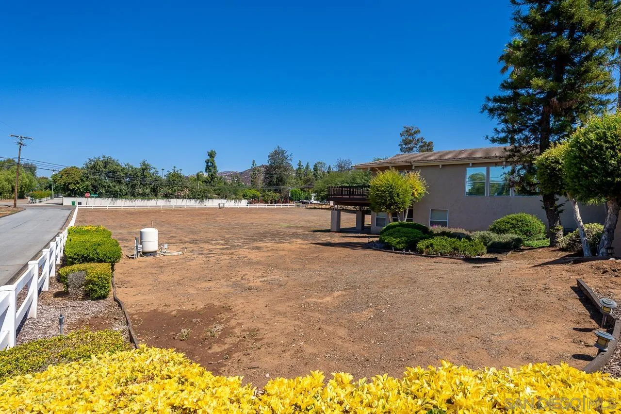 719 Singing Trails Drive El Cajon, CA 92019 - Photo 57 of 73 a view of a lake with a house in the background