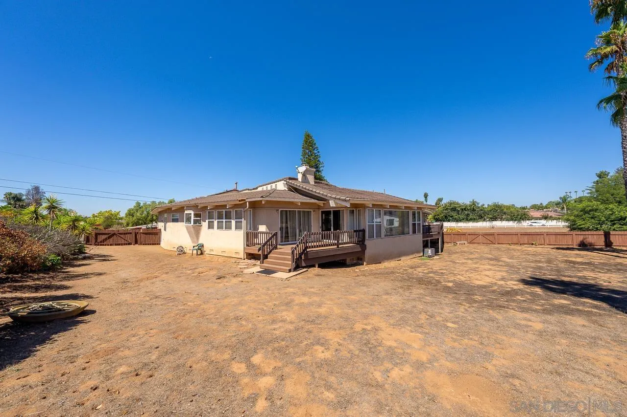 719 Singing Trails Drive El Cajon, CA 92019 - Photo 70 of 73 a view of a house with a yard