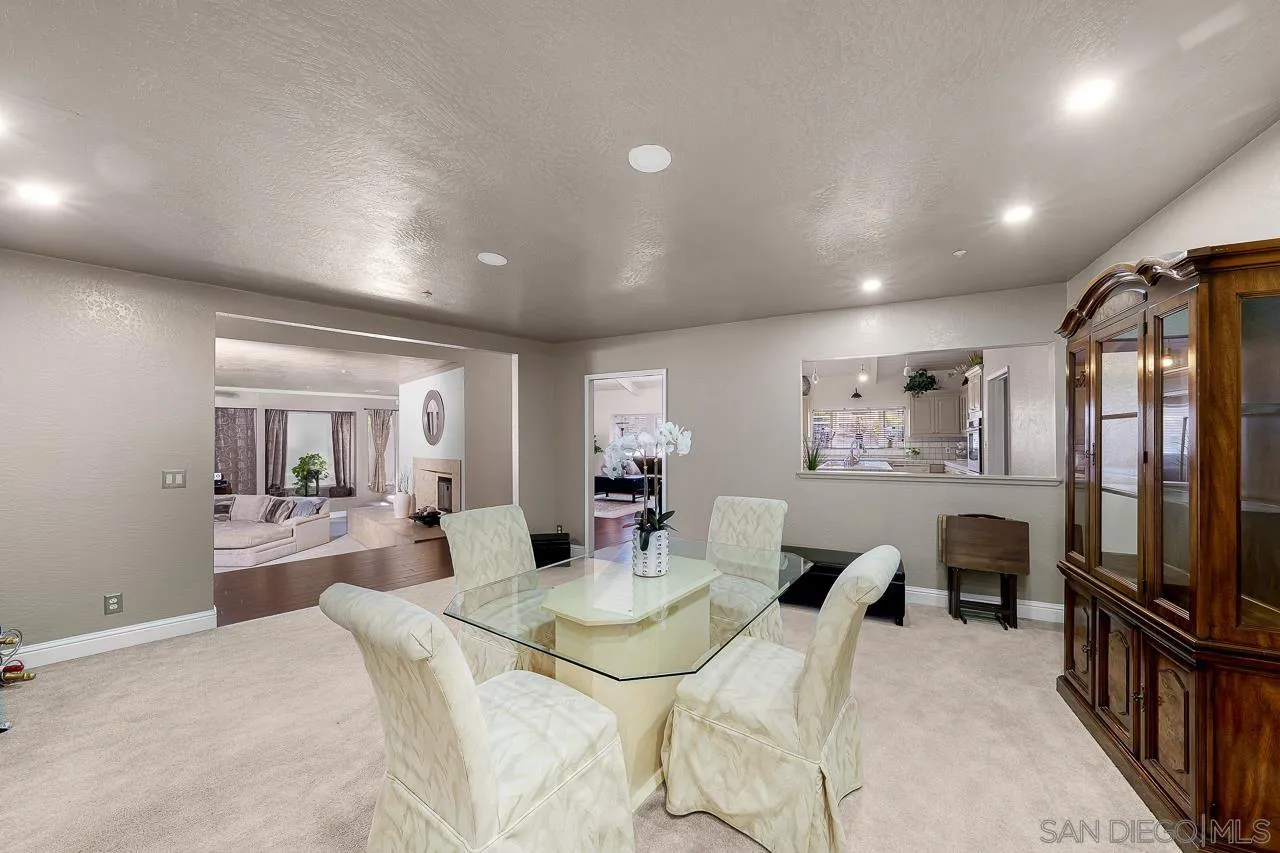 719 Singing Trails Drive El Cajon, CA 92019 - Photo 9 of 73 a large bedroom with furniture a flat screen tv and a faucet