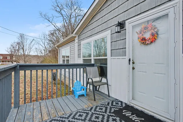 a view of balcony with wooden floor