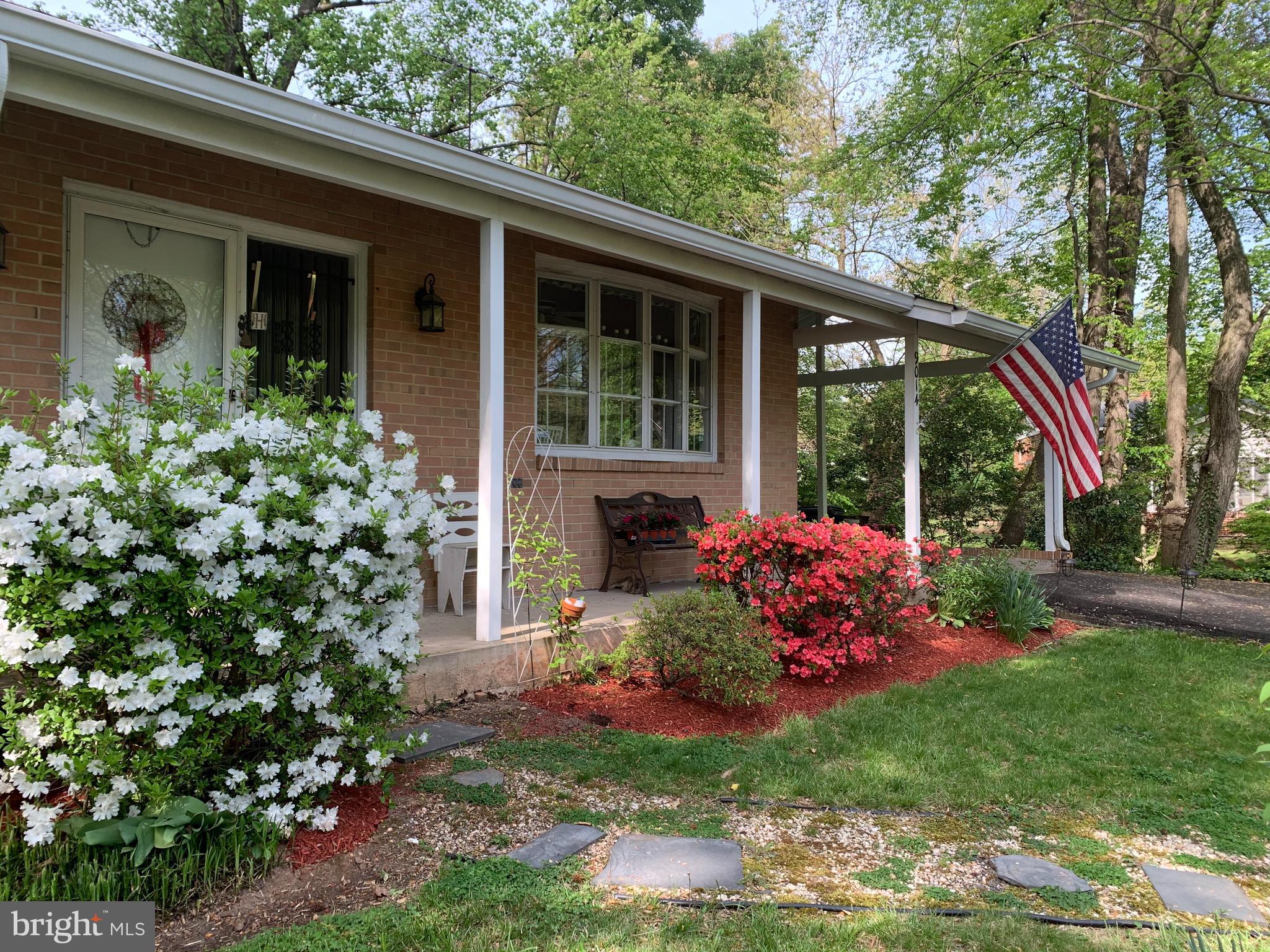 9014 Spring Avenue Lanham, MD 20706 - Photo 7 of 54 Enjoy the flowers from your front porch