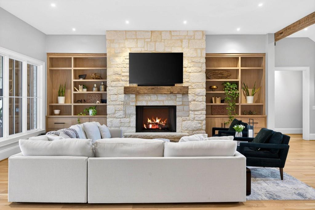 1050 Hamilton Road Northwest Kennesaw, GA 30152 - Photo 11 of 72 a living room with furniture fireplace and flat screen tv