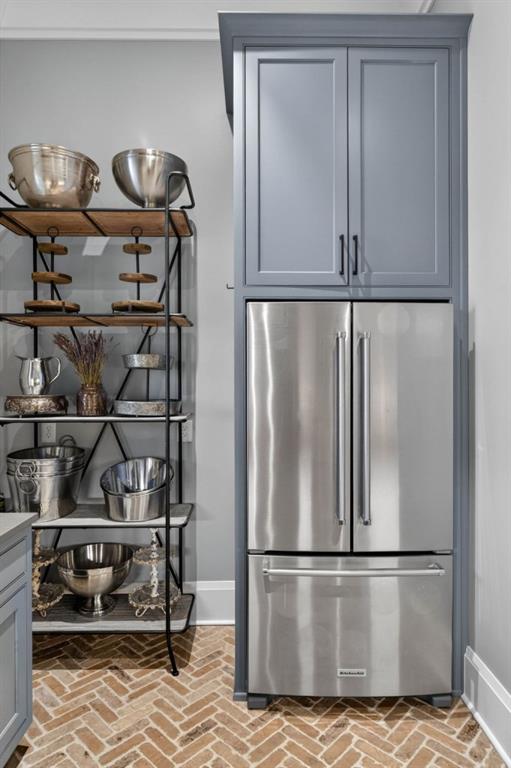 1050 Hamilton Road Northwest Kennesaw, GA 30152 - Photo 29 of 72 a kitchen with a refrigerator and cabinets