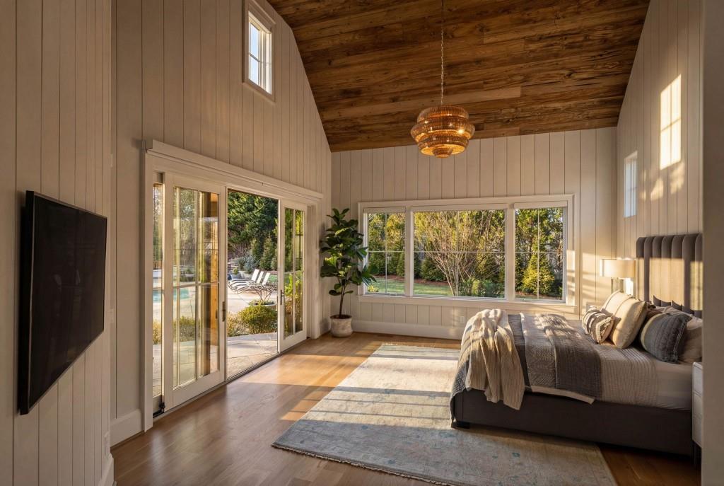 1050 Hamilton Road Northwest Kennesaw, GA 30152 - Photo 35 of 72 a living room with furniture and a flat screen tv