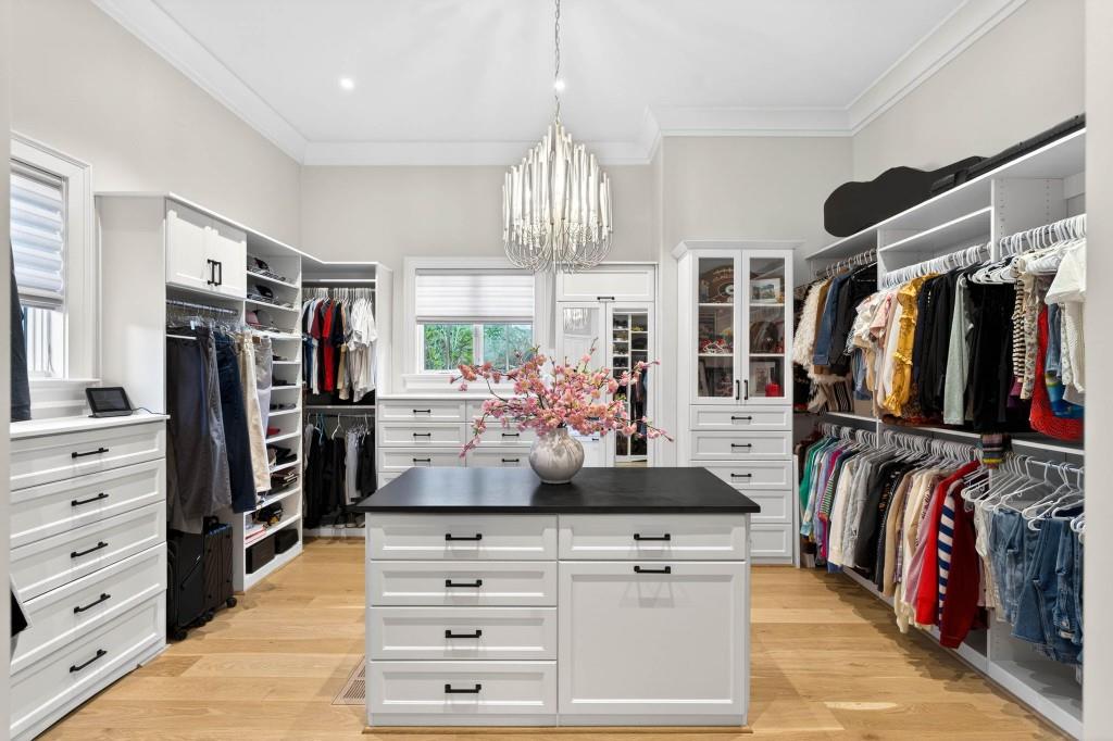 1050 Hamilton Road Northwest Kennesaw, GA 30152 - Photo 39 of 72 a view of walk in closet with clothes and shoes
